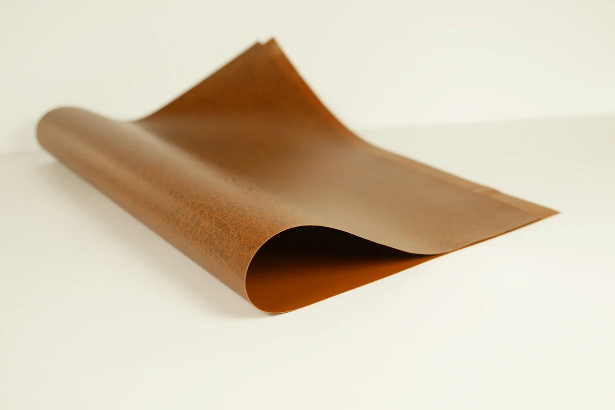 Real leather grain, rough back and cut edge used to identify genuine leather